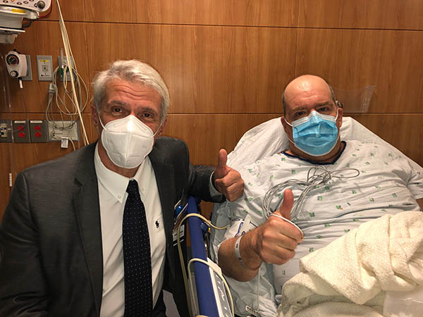 Dr. Pier Giulianotti, director of the Robotic Surgery Program at UI Health, with patient Christopher Adamsickon Sept. 24, 2020. Adamsick is the world&rsquo;s first polycystic kidney disease patient to receive a robotic double nephrectomy and kidney transplant.