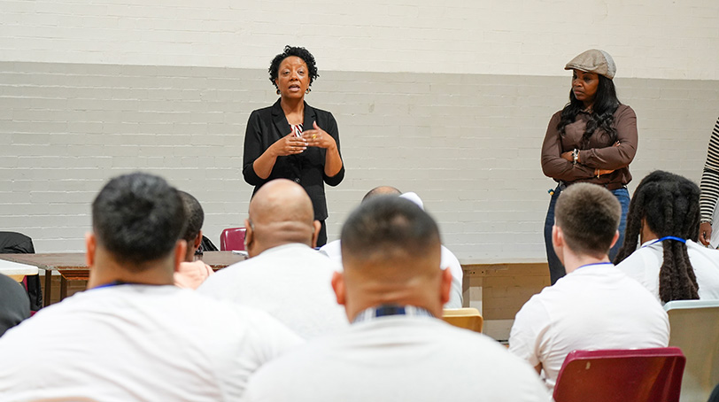 Charisse speaks with residents at the Safer Foundation
