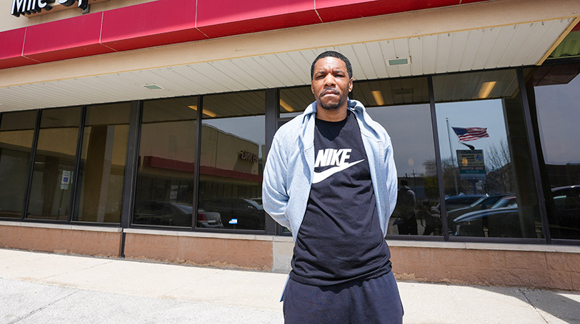 Martez stands outside our Back of the Yards clinic